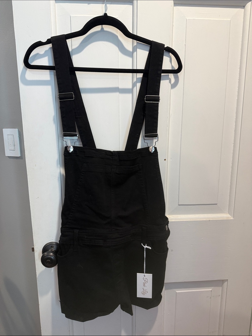 Black overall shorts
